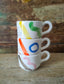 Tazza Cappuccio "Love Burns" Arancio e Blu.